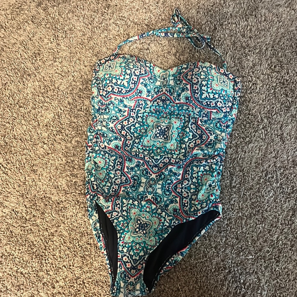 Athleta size S swimsuit with exciting design and fun colors.